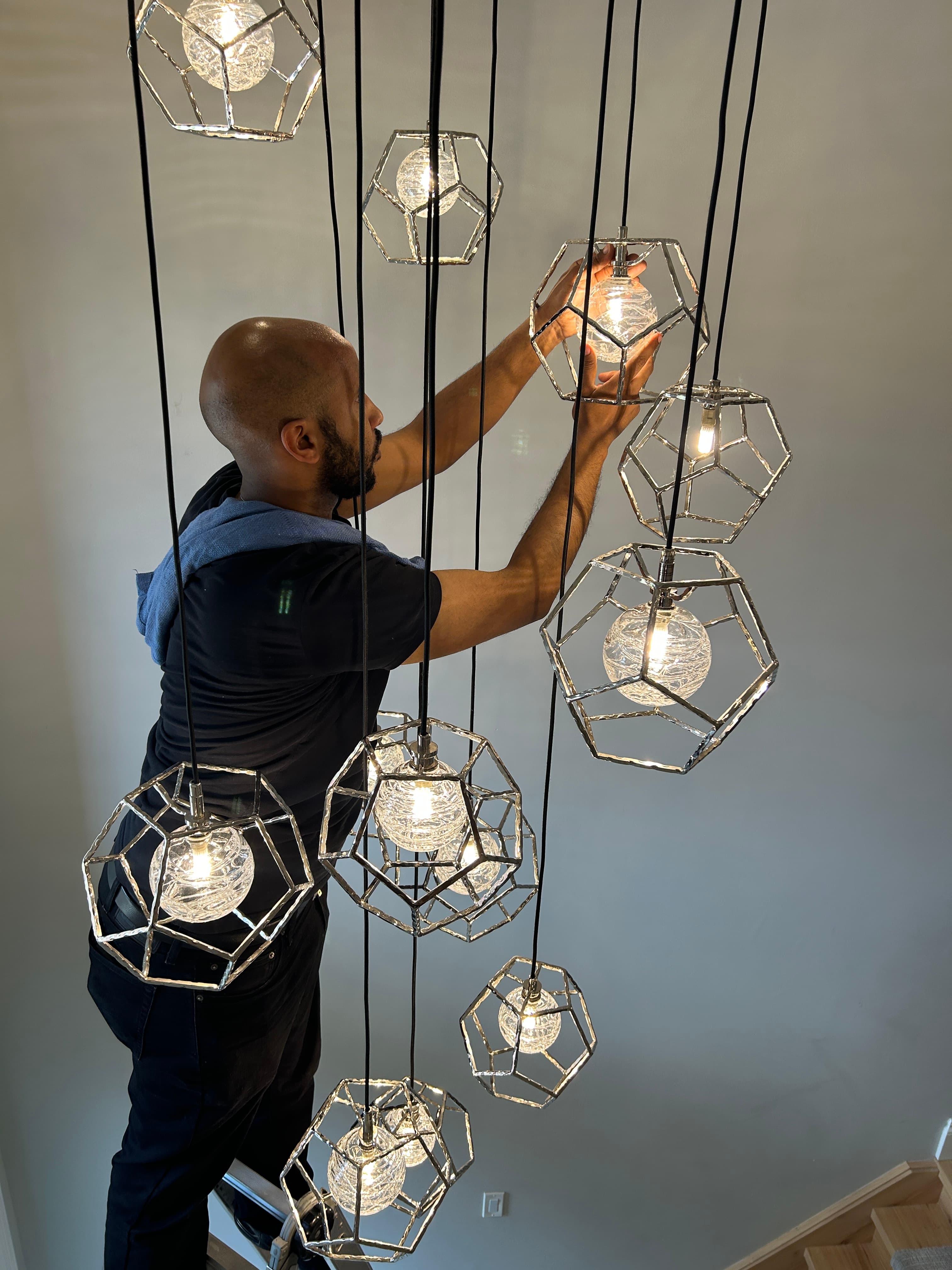 Careful work on pendant light fixture