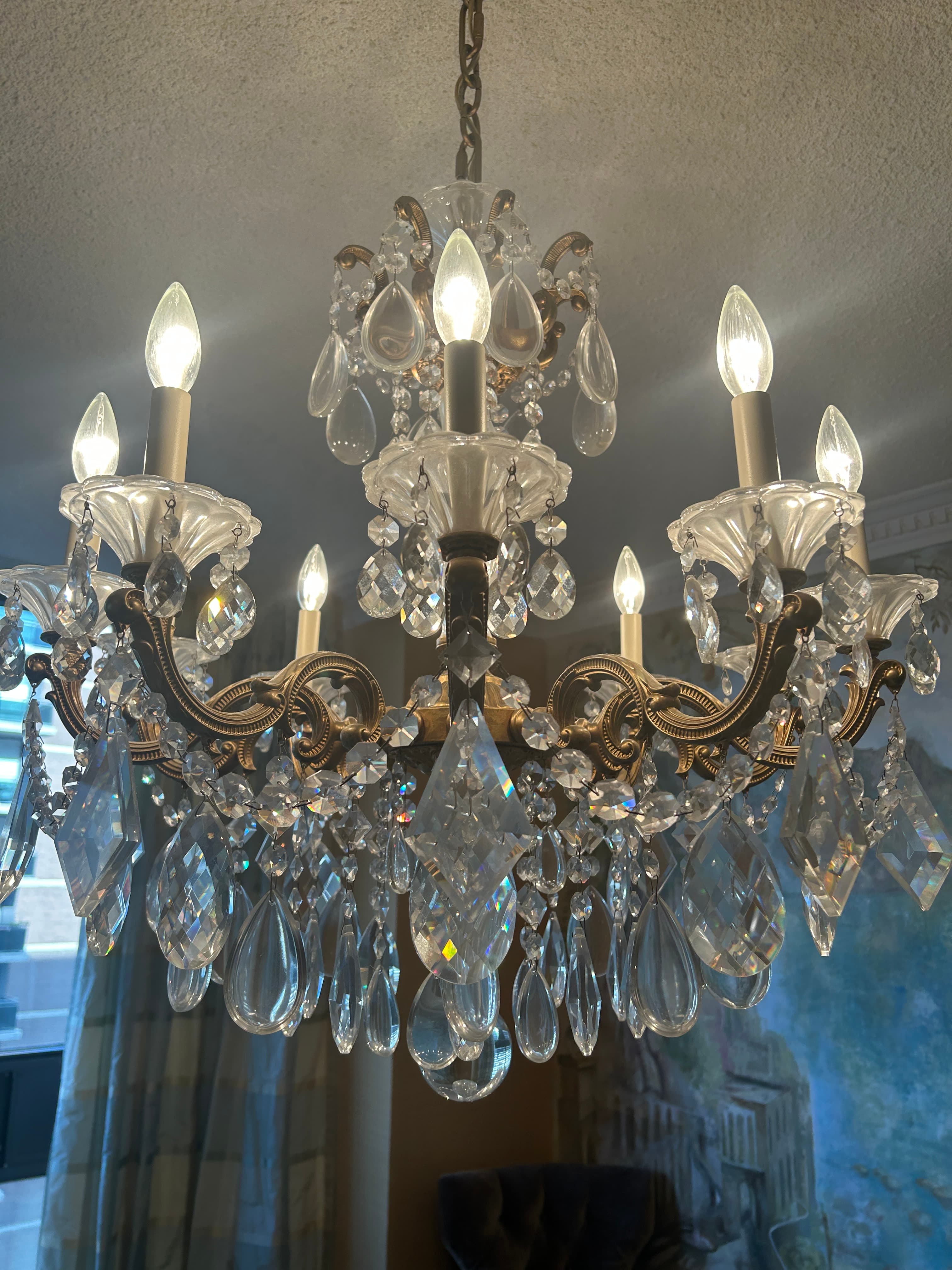 Chandelier before cleaning - dusty and dull